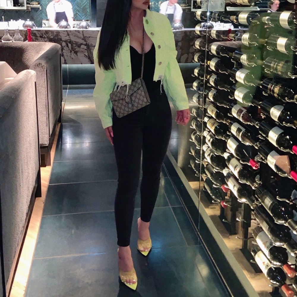 Neon green cropped denim jacket from Zara